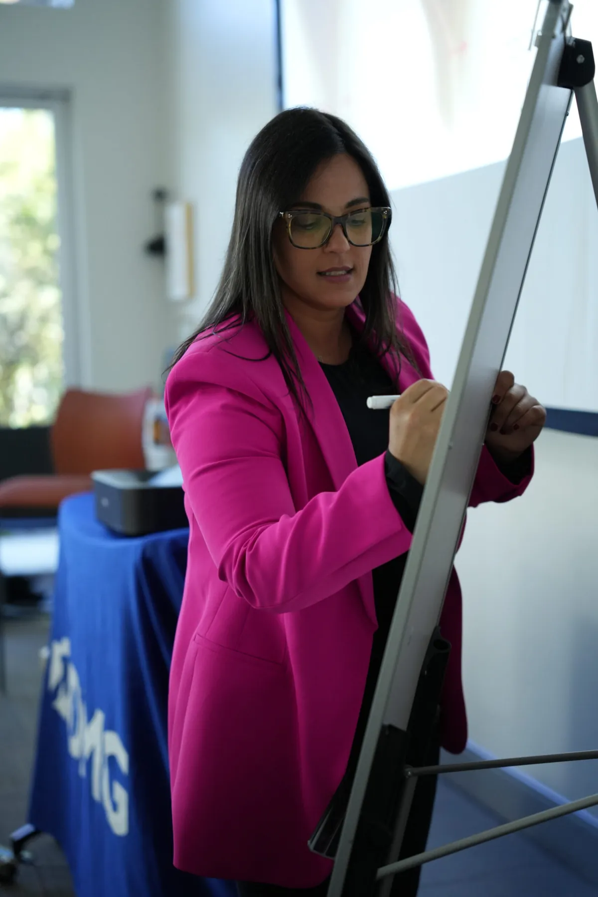 Dr. Andi-Jean Miro teaching dentists at a Stribe course