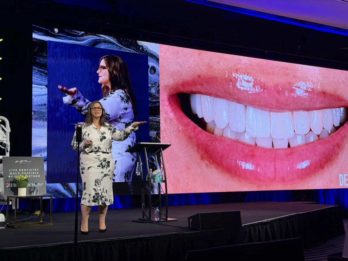 Dr. Andi-Jean Miro presenting a porcelain veneer smile transformation on stage — how long do veneers last