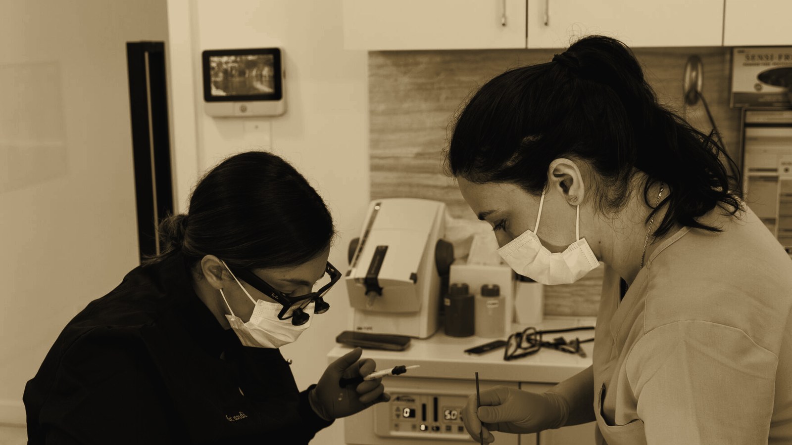 Dr. Andi working chairside during a smile transformation appointment